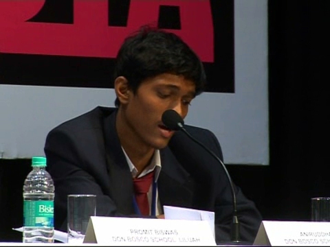 Here is an Image of An Indian University Student participating in the national debate "Debating Matters India" (Indian Students Debate What Matters)