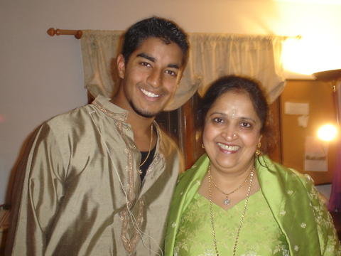 Vikram (left) with his mother in traditional Indian attire. Usually, Vikram is wearing jeans and a t-shirt, but puts on his ethnic tunic at family gatherings and holidays.