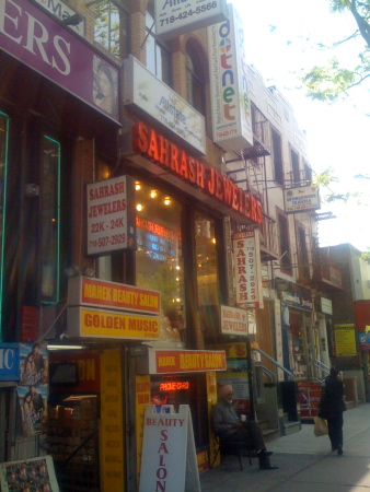 An example of the dual-business tactic employed in Jackson Heights. The stores are seemingly "stacked" on top of each other, which maximizes the area available in each building. This method not only utilizes all of the resources available in each building but also creates good business relationships between adjacent shop owners. These shop owners can then use this nascent relationship to their advantage by sharing customers to increase the foot traffic in their stores, and more importantly their profits.  