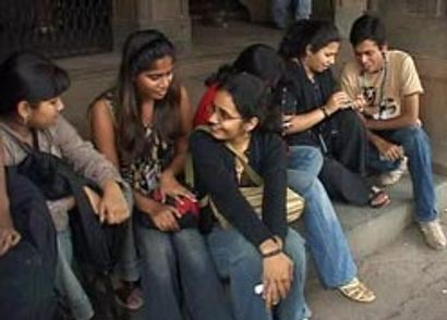 A group of South Asian teenagers spending time together and taking a break from their studies. Image (c) http://www.theindiastreet.com/node/676