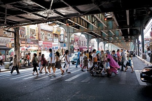 A photograph of pedestrians in Jackson Heights of different races from the magazine Time Out New York taken by Michael Kirby