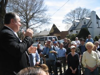 Fresh Meadows Homeowners Civic Association President Jim Gallagher address a crowd at a rally