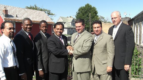     Frank Galluscio, District Manager of Community Board # 6 is second from the right.  