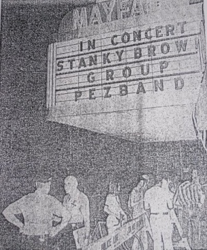 Mayfair Theater hosts rock concert in May 1975, despite community protests.