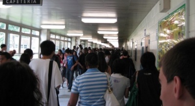 Students walk down the main hallway at FLHS, known as "The Strip"