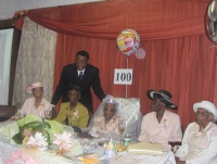 976 Prospect Place. This is the 100th birthday of the woman sitting in the middle. The women around her are all in their nineties and have been attending Hebron SDA Church since their teens.  