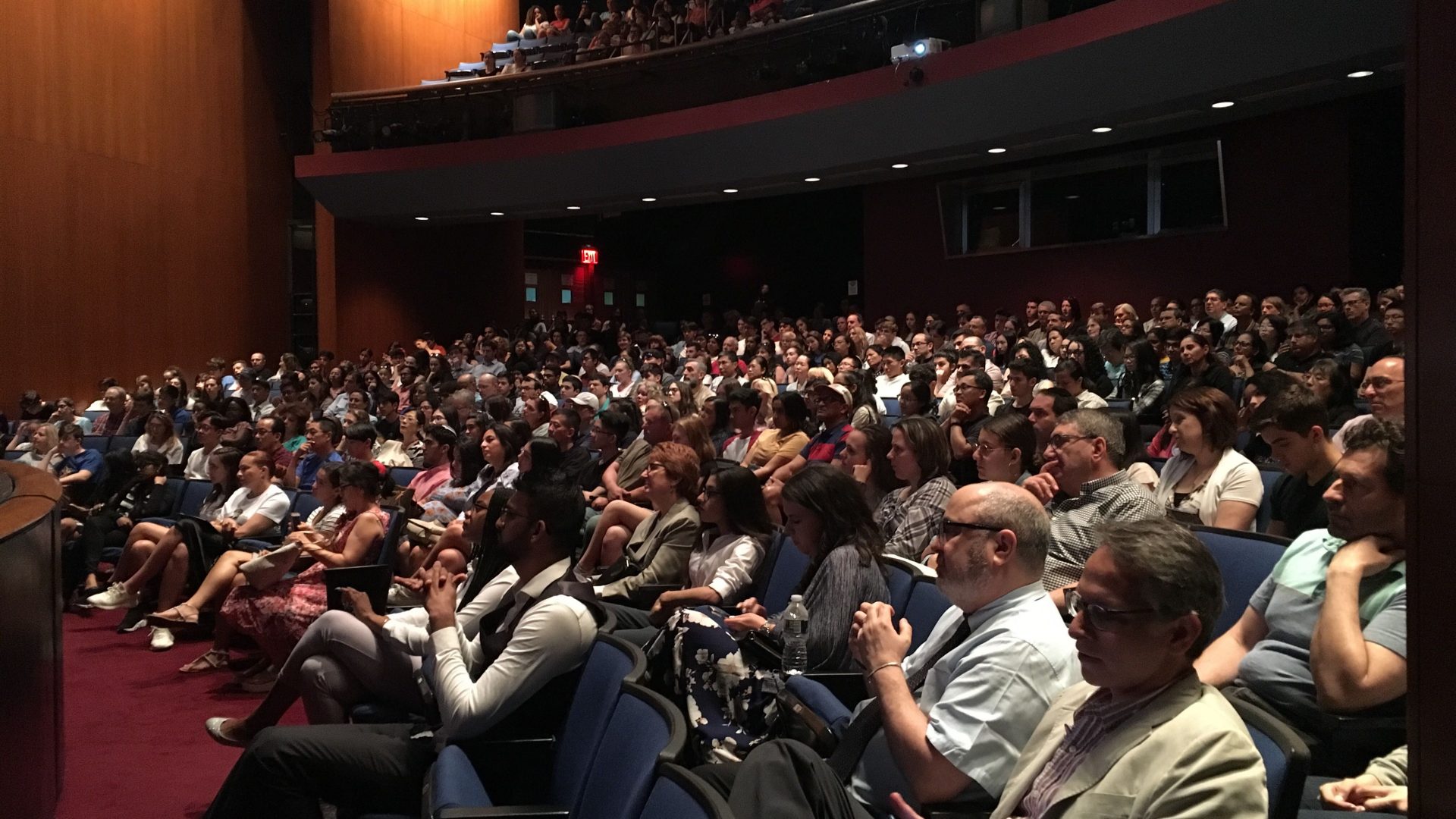 Prospective students and families attend Macaulay open house event at John Jay College Gerald Lynch Theater.