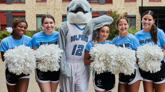 College of Staten Island students and their mascot, the dolphin.
